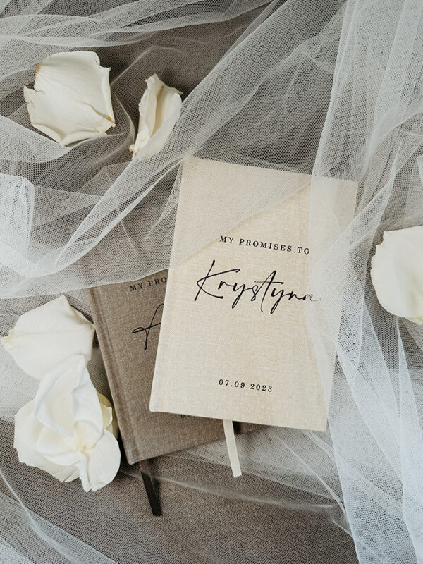 Detail shot of custom vow books for a wedding in Temecula, CA. Photo by Wolfe Creative.